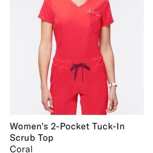 Never worn Jaanuu scrub top.